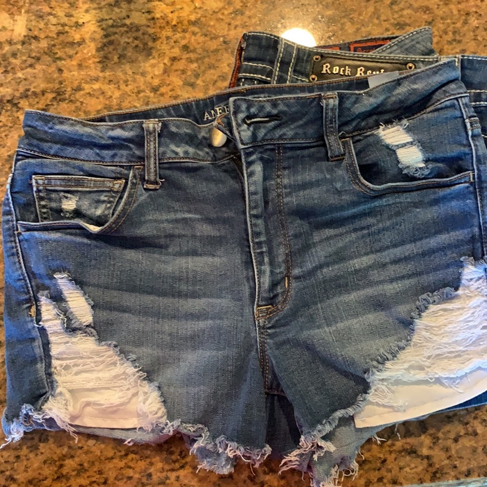 Distressed high rise shortie cut offs